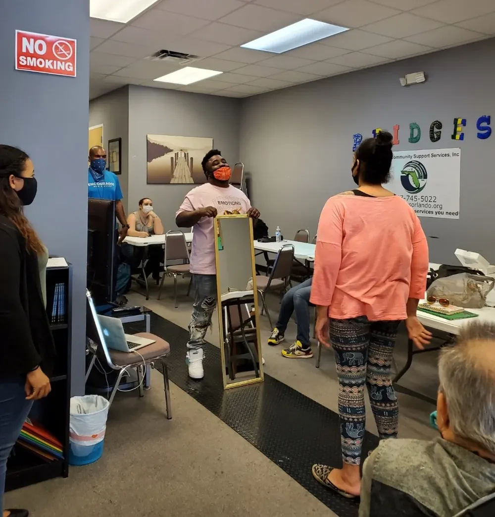 Bridges Community Support Services classroom and group activity space with staff and clients in Orlando, Florida