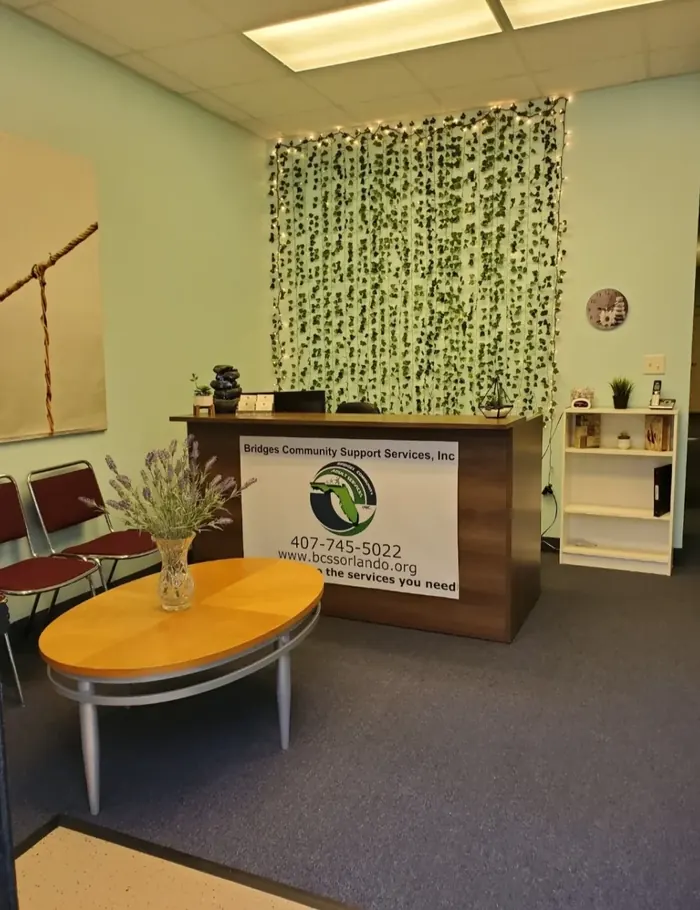 Reception desk and welcoming lobby area at Bridges Community Support Services Orlando office