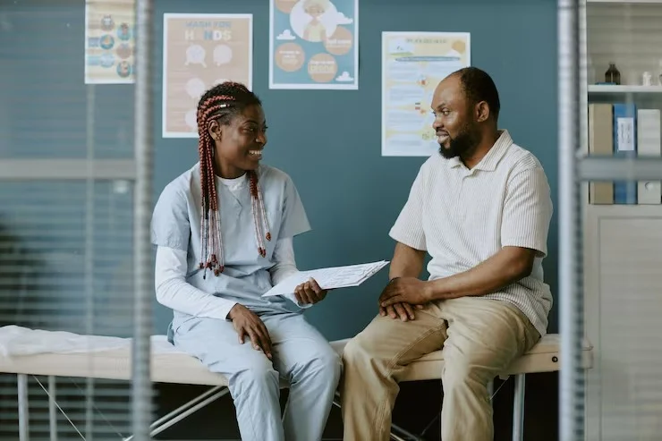 Healthcare worker discussing personalized crisis prevention treatment plans with a patient at BCSS in Orlando FL
